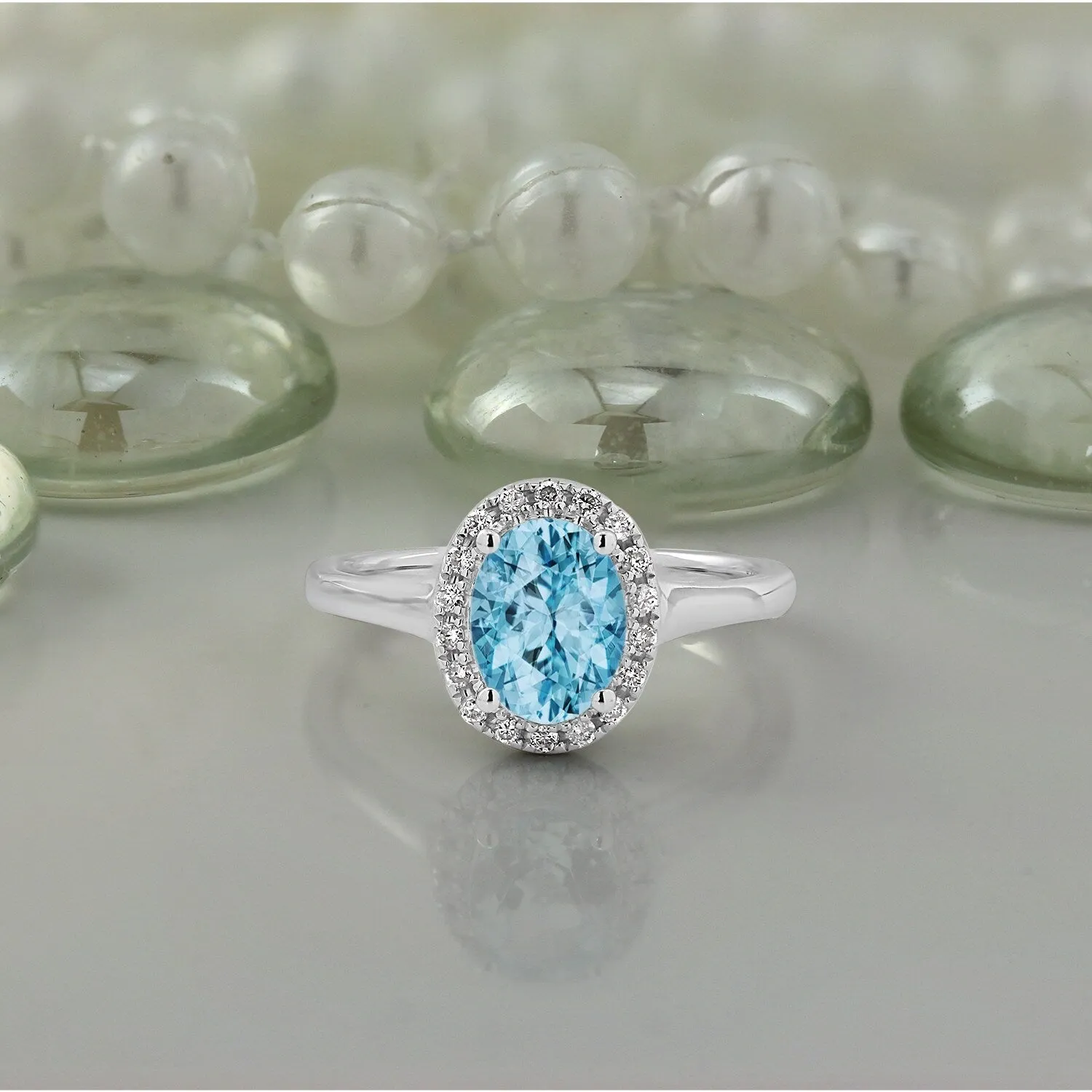 Auriya Classic 1ct Oval Sky Blue Topaz and Halo Diamond Engagement Ring 1/8cttw 14k Gold sold by Zulily