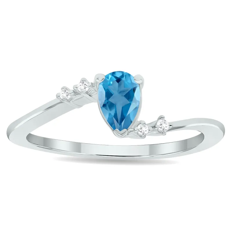 Women's Blue Topaz and Diamond Wave Ring in 10K White Gold sold by Zulily