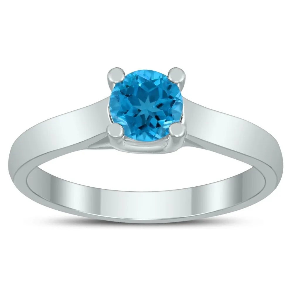 Round 5MM Blue Topaz Cathedral Solitaire Ring in 10K White Gold sold by Zulily