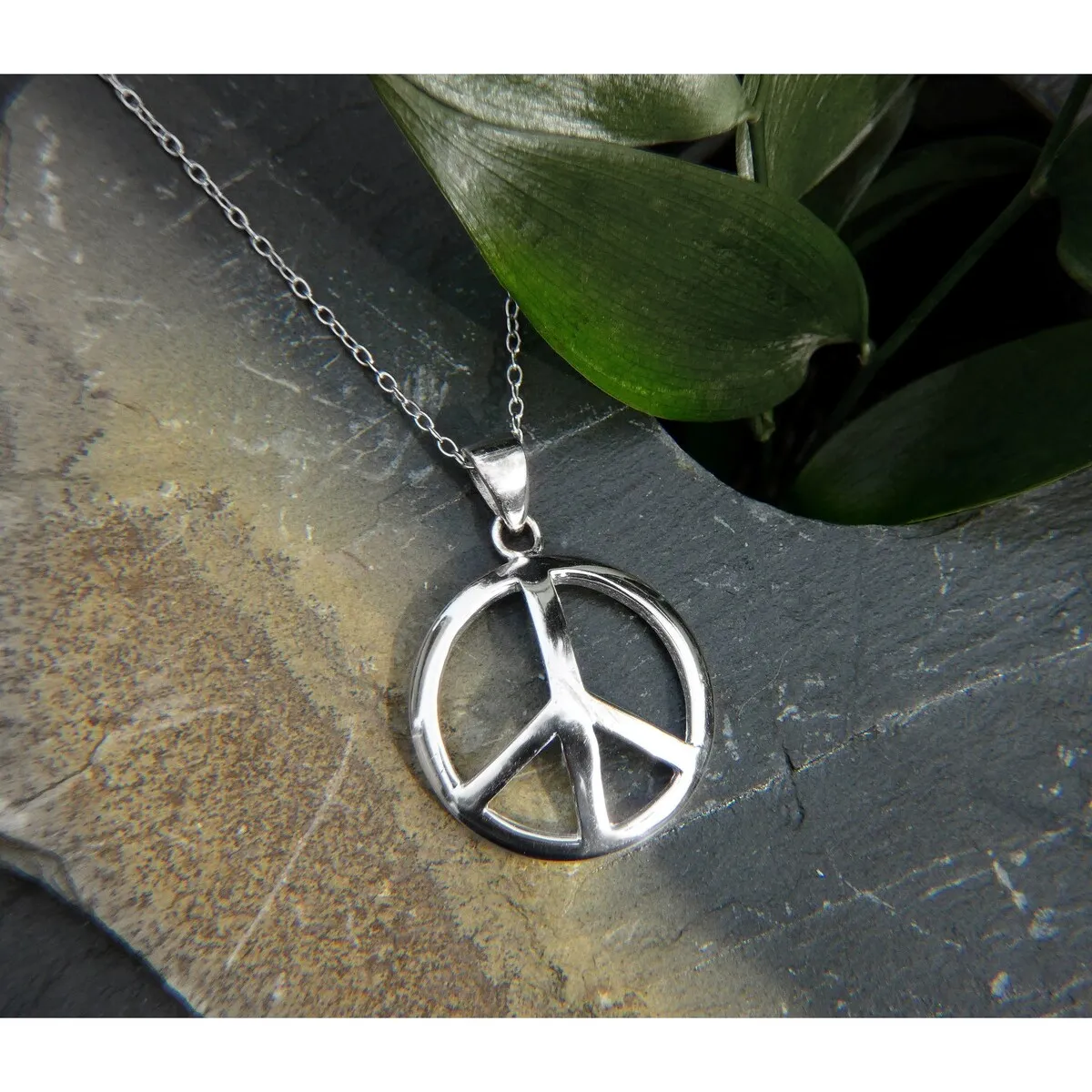 Vera & Co. Sterling Silver Peace Sign Charm Necklace sold by Zulily