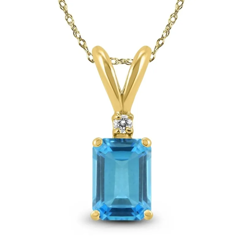 14K Yellow Gold 7x5MM Emerald Shaped Blue Topaz and Diamond Pendant sold by Zulily