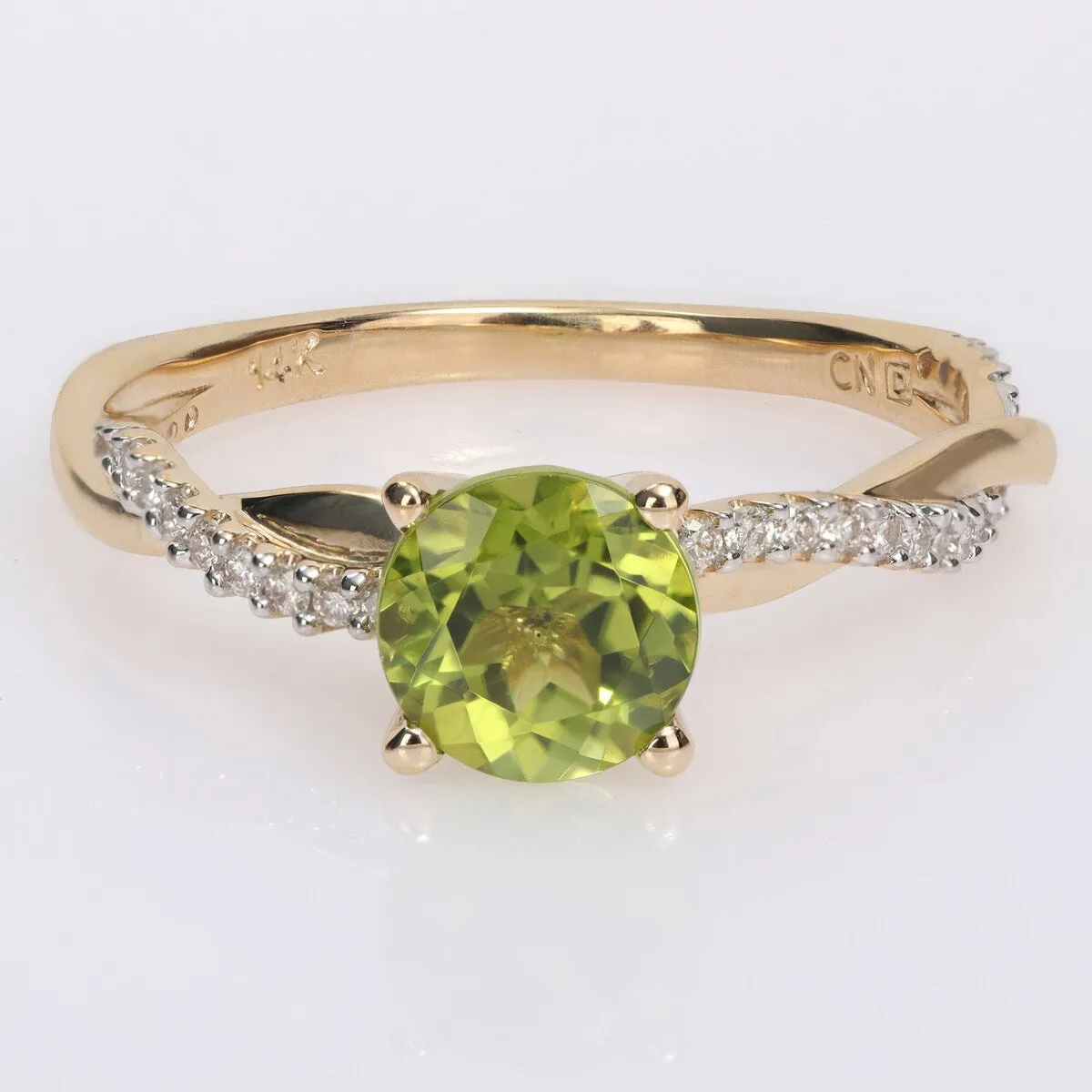 Miadora Peridot and 1/6ct TDW Diamond Crossover Birthstone Ring in 14k Yellow Gold sold by Zulily