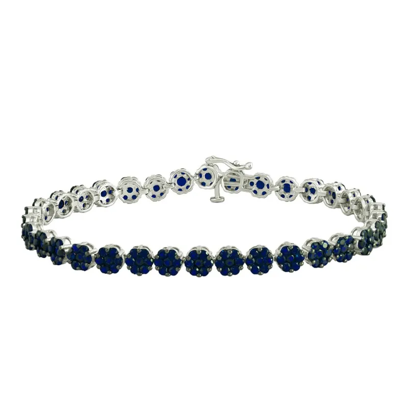 Sterling Silver with Blue Sapphire Flower Line Bracelet - 7.25" sold by Zulily