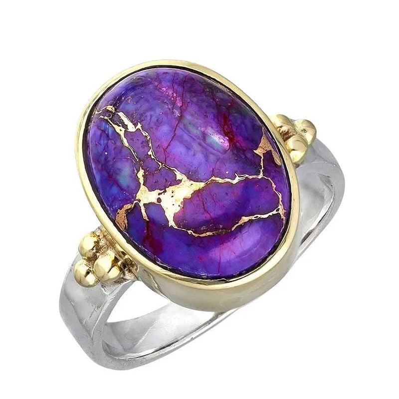 Sterling Silver Oval Shaped Purple Copper Turquoise with Brass Accents sold by Zulily