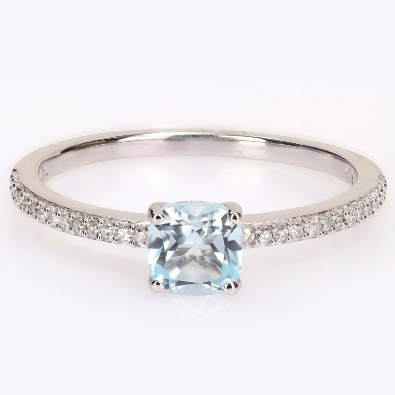 Miadora 10k White Gold Cushion-cut Blue Topaz and 1/10ct TDW Diamond Birthstone Ring sold by Zulily