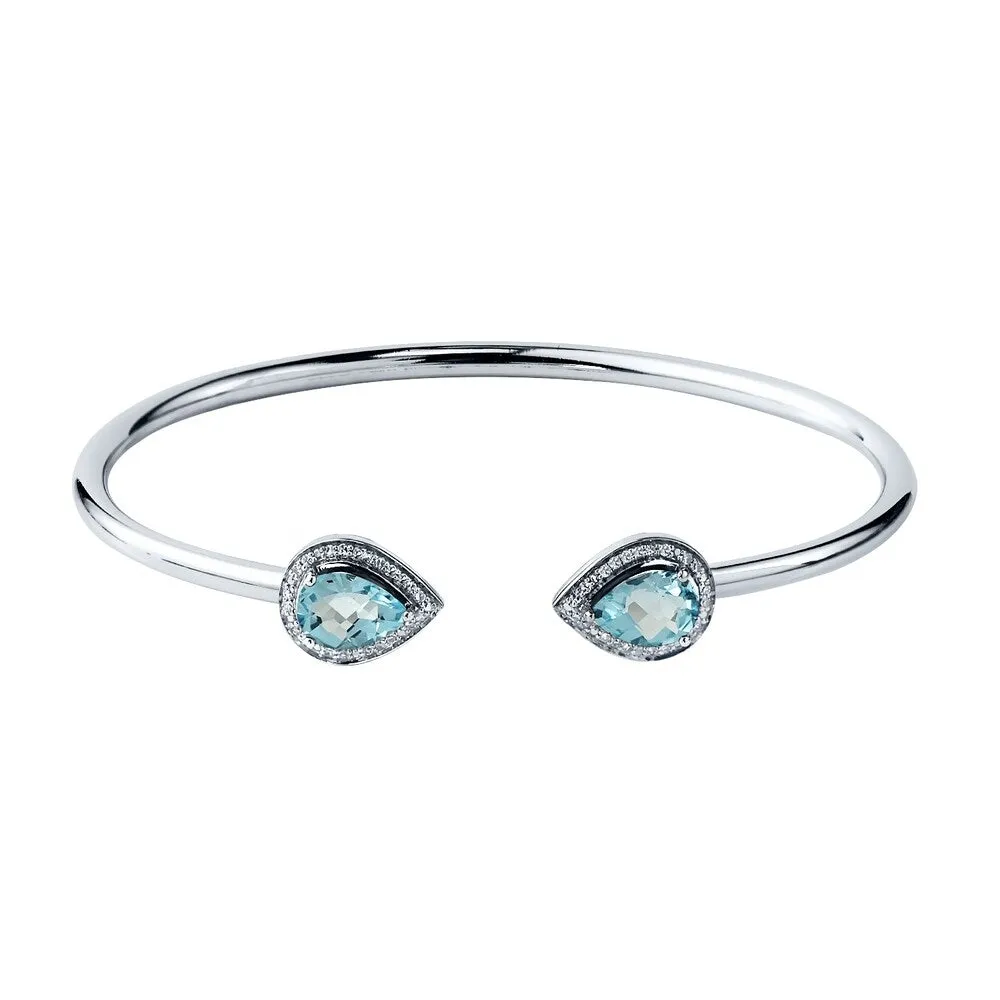 Auriya 2ct Pear-cut Sky-Blue Topaz Gold over Silver Bangle Bracelet with Diamond Accents sold by Zulily