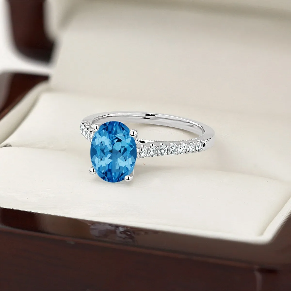 Auriya 1 1/2ct Fancy Oval Swiss Blue Topaz and Diamond Engagement Ring 1/4ctw 14k Gold sold by Zulily