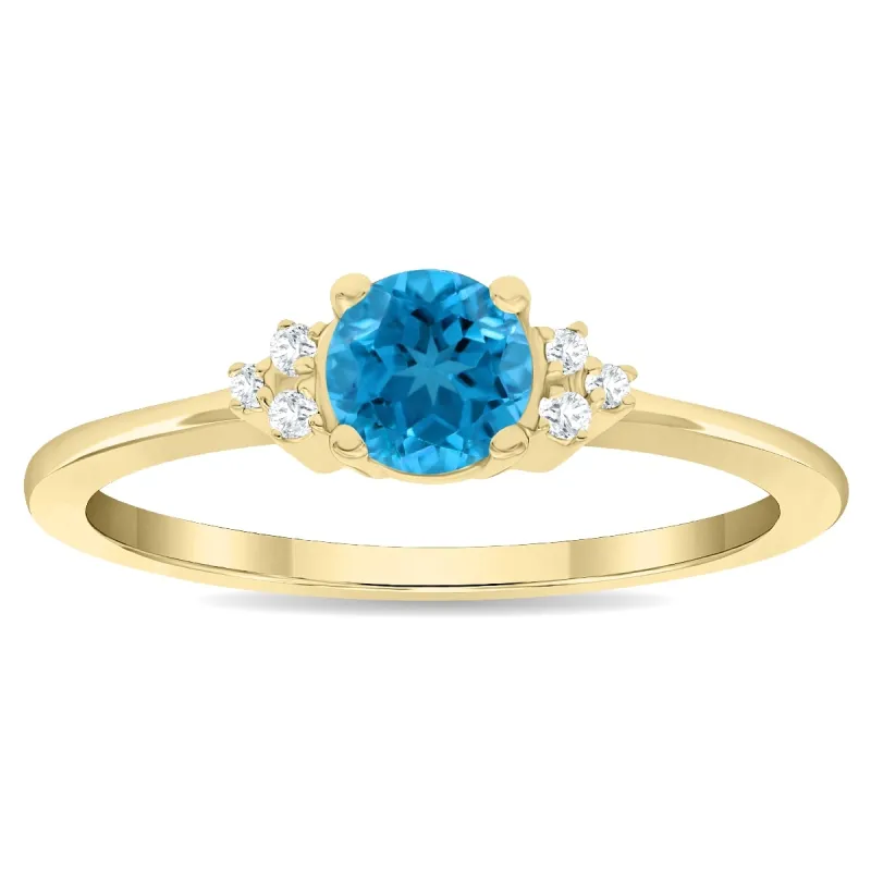 Women's Round Shaped Blue Topaz and Diamond Half Moon Ring in 10K Yellow Gold sold by Zulily