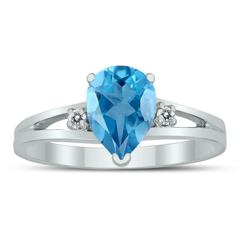 8X6MM Blue Topaz and Diamond Pear Shaped Open Three Stone Ring in 10K White Gold sold by Zulily