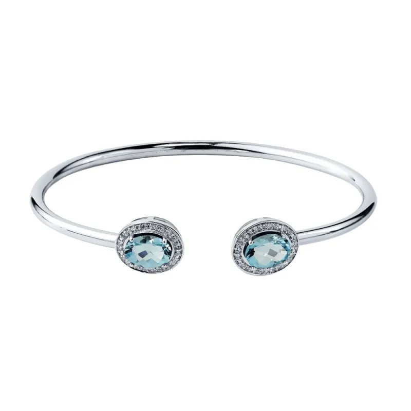 Auriya 3ct Oval Sky Blue Topaz Gold over Silver Bangle Bracelet with Diamond Accents sold by Zulily