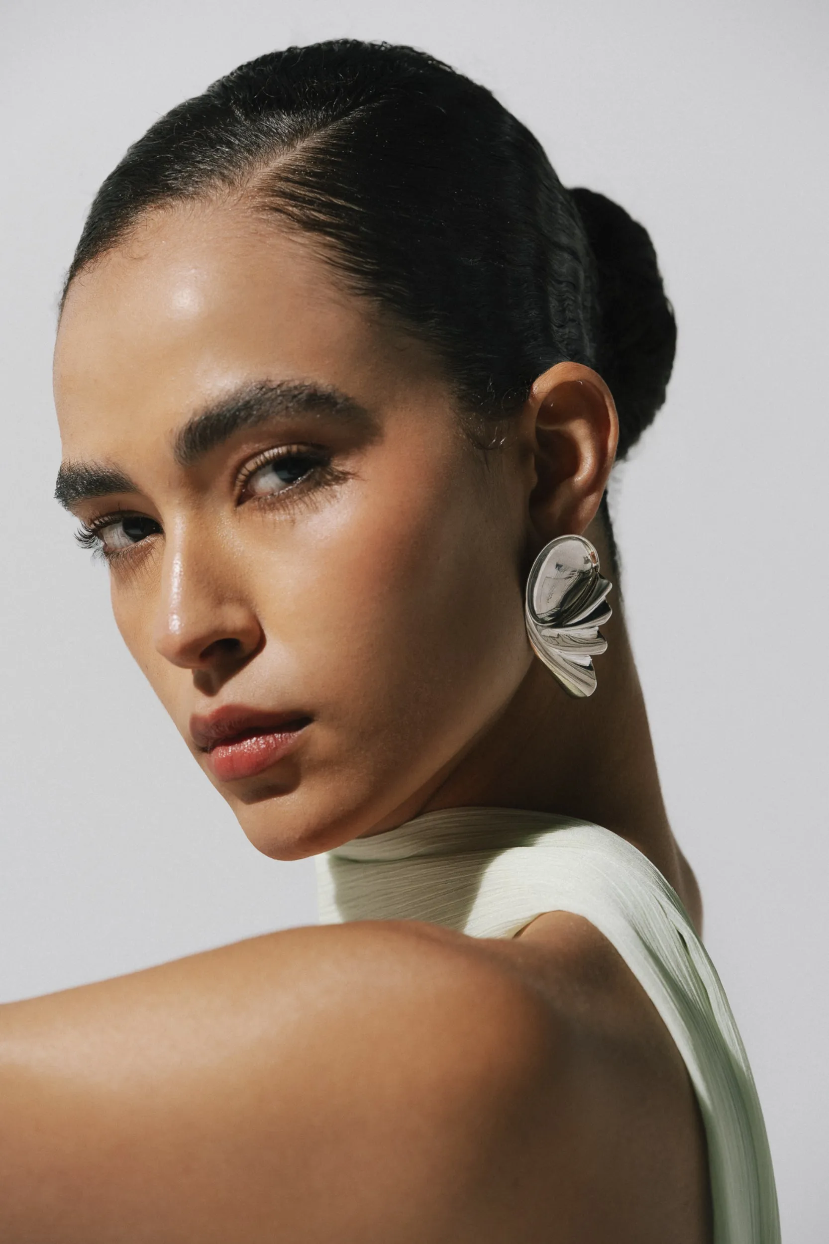 Nautillus Earrings sold by BAOBAB