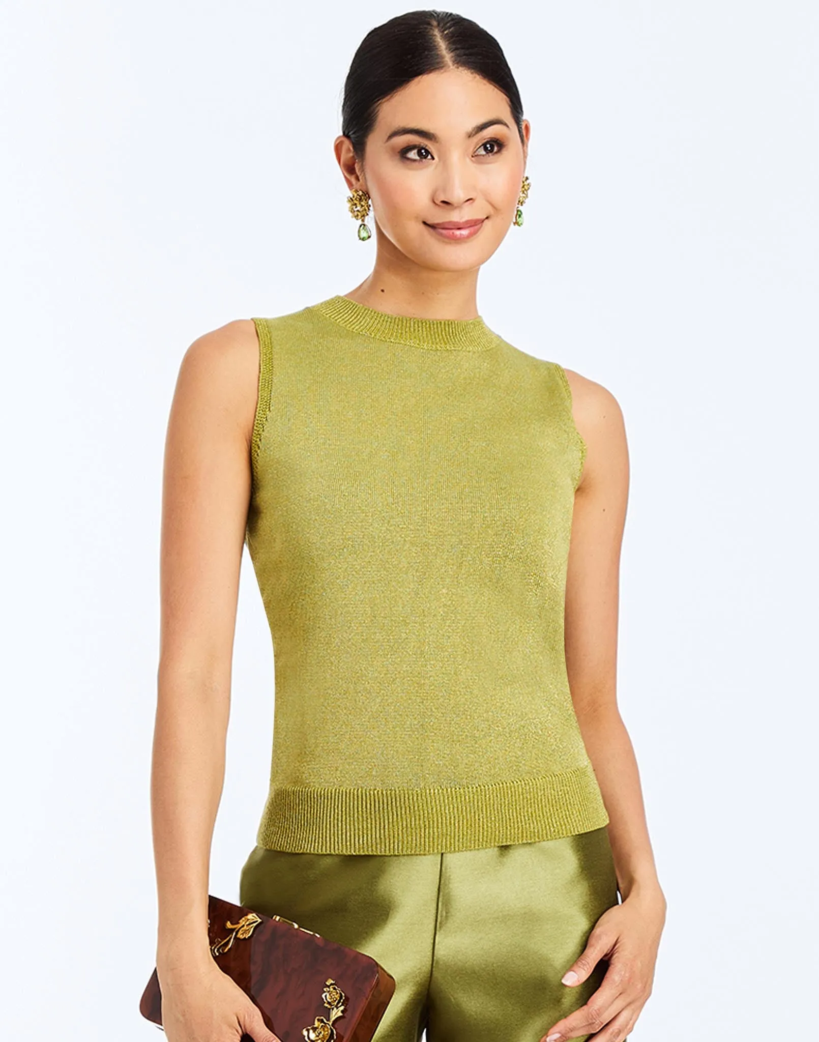 Soho Metallic Knit Top sold by MESTIZA