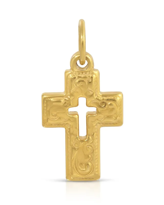 Ornate Cross Charm sold by KOZAKH