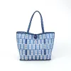 Small | Denim Light Wash sold by The Lilley Line