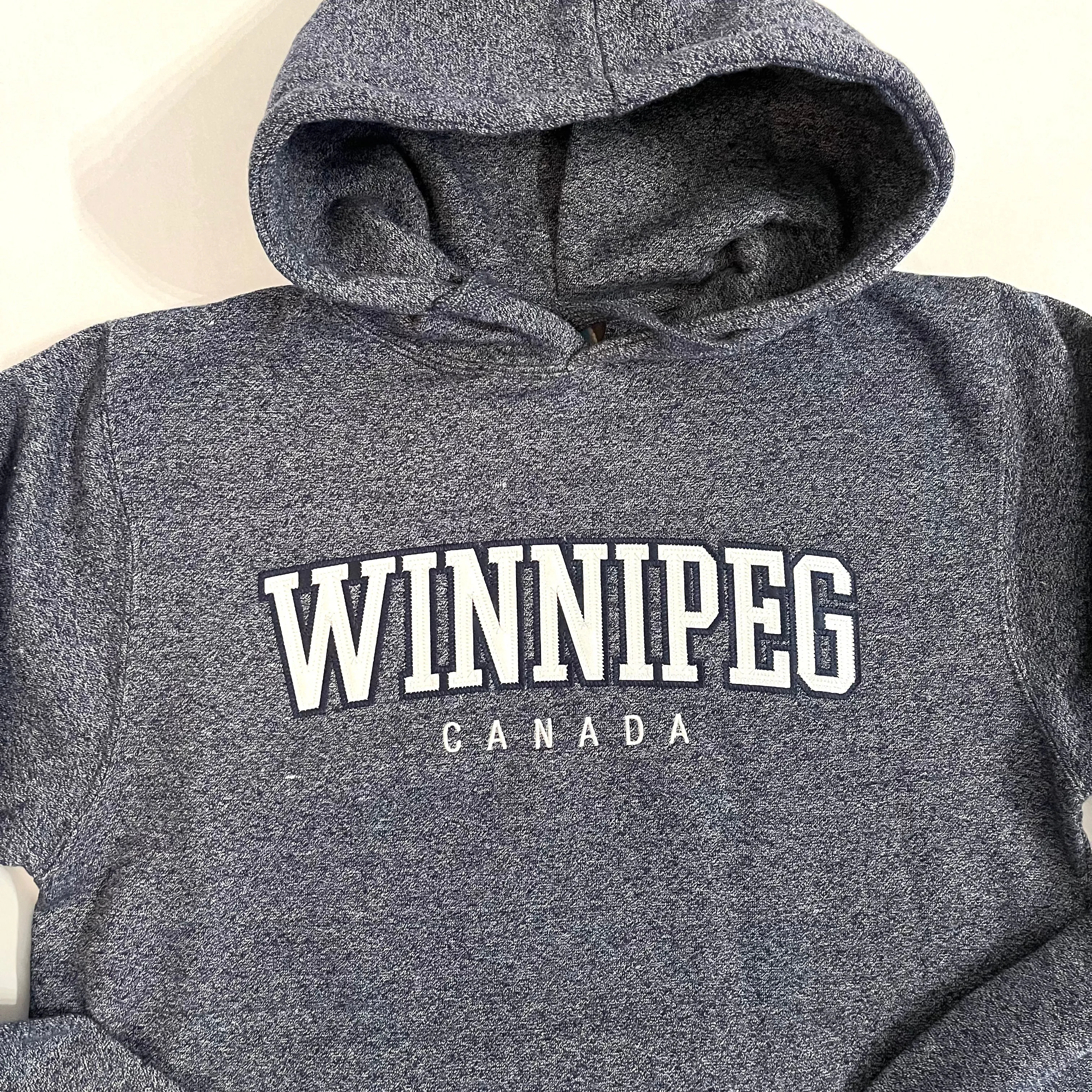 WINNIPEG APPLIQUE HOODIE sold by Oh Canada WPG