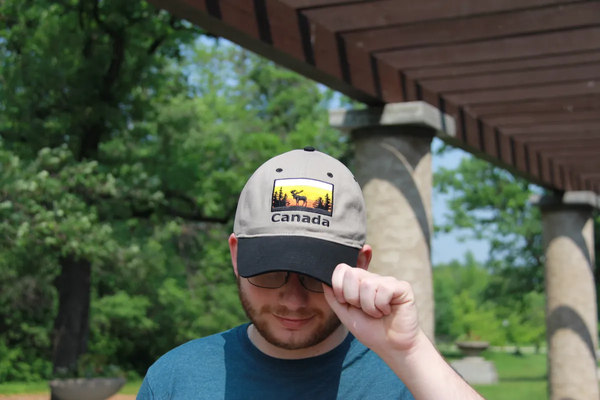 SUNSET MOOSE HAT sold by Oh Canada WPG