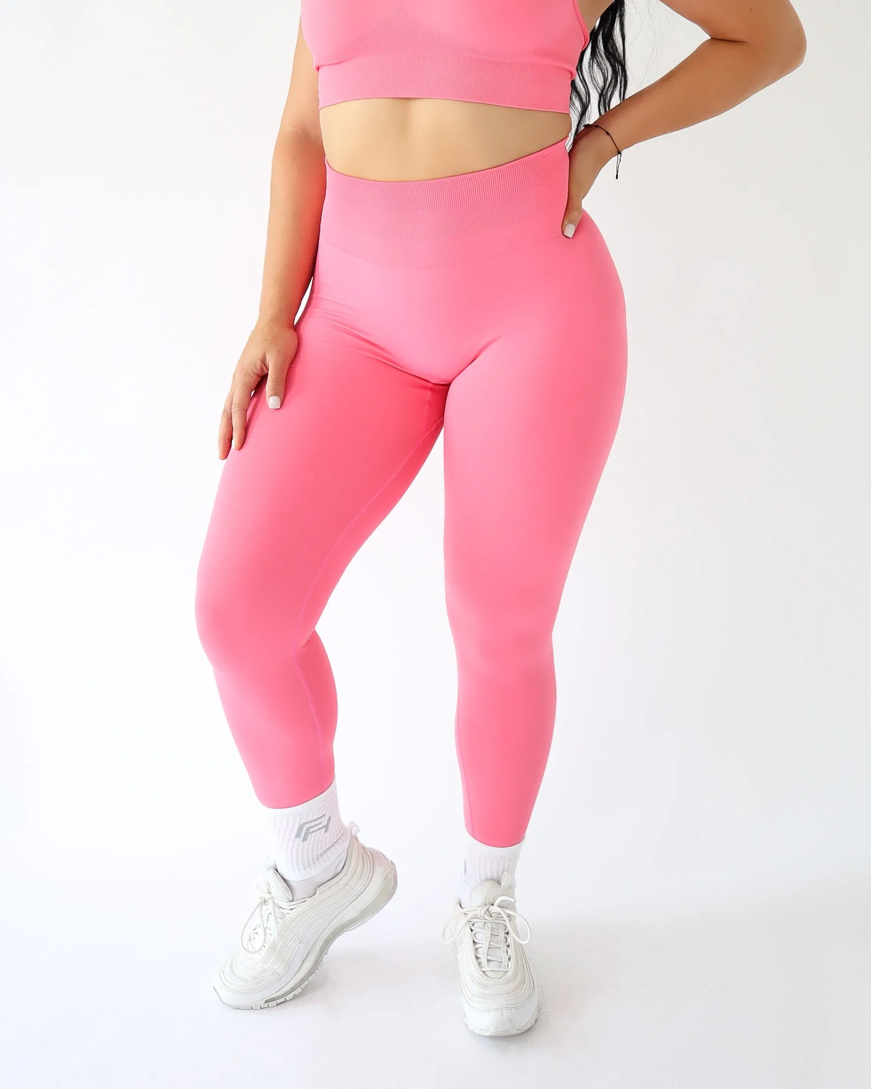 Enhance Leggings - Coral sold by First Health Apparel