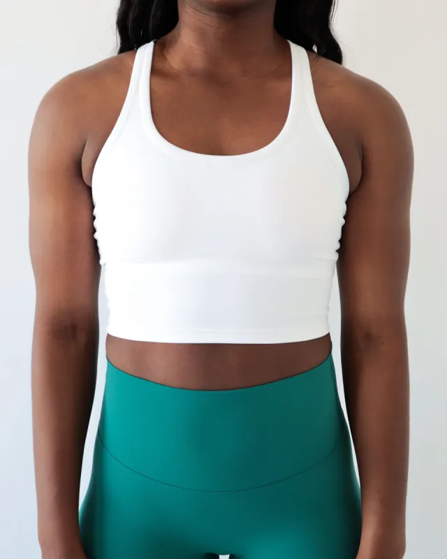 PERFORMANCE RACERBACK TOP - White sold by First Health Apparel