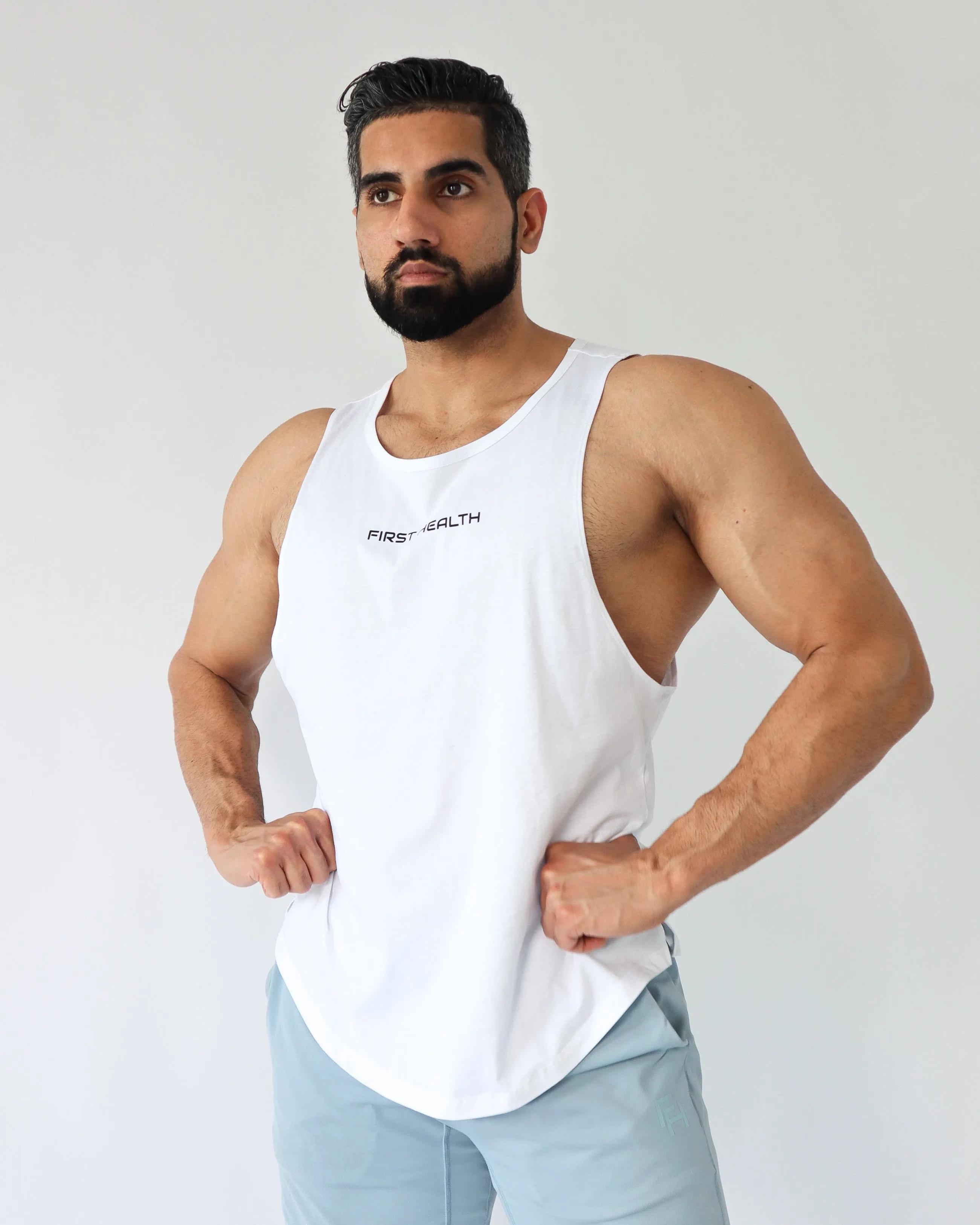 VITAL TANK TOP- White sold by First Health Apparel