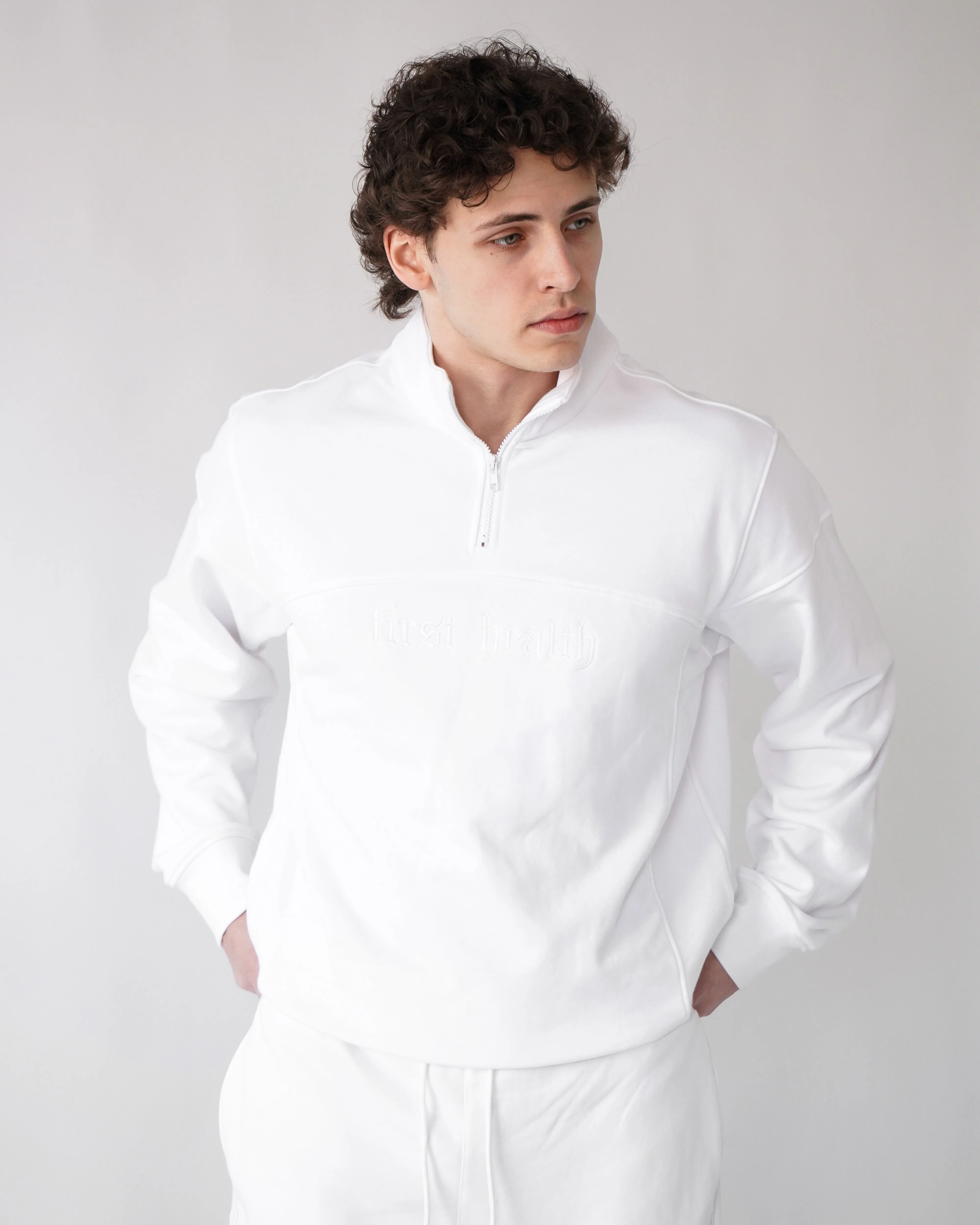Essential Quarter Zip - White sold by First Health Apparel