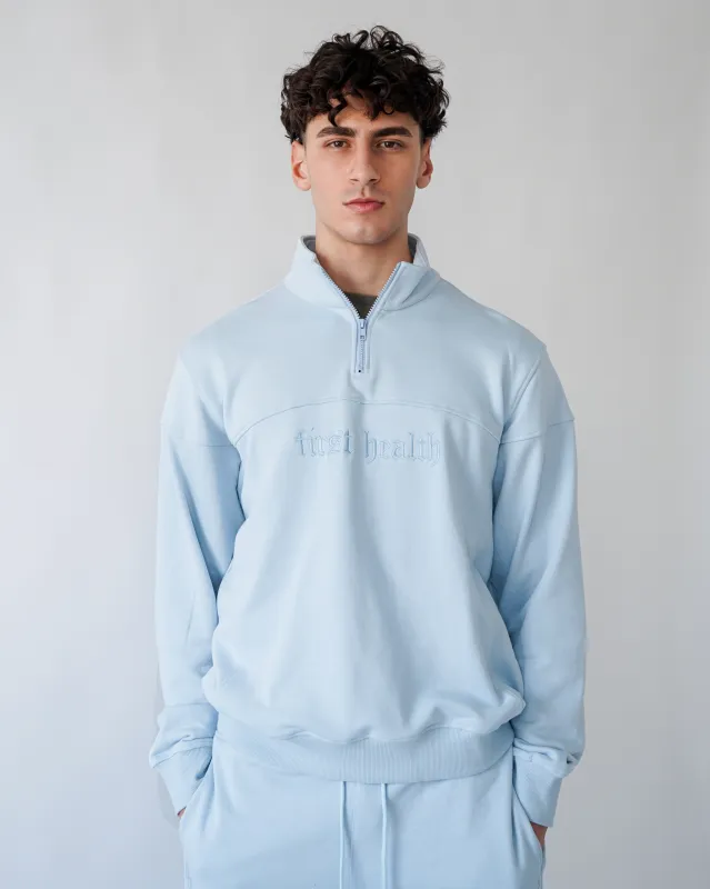 Essential Quarter Zip - Cloud sold by First Health Apparel
