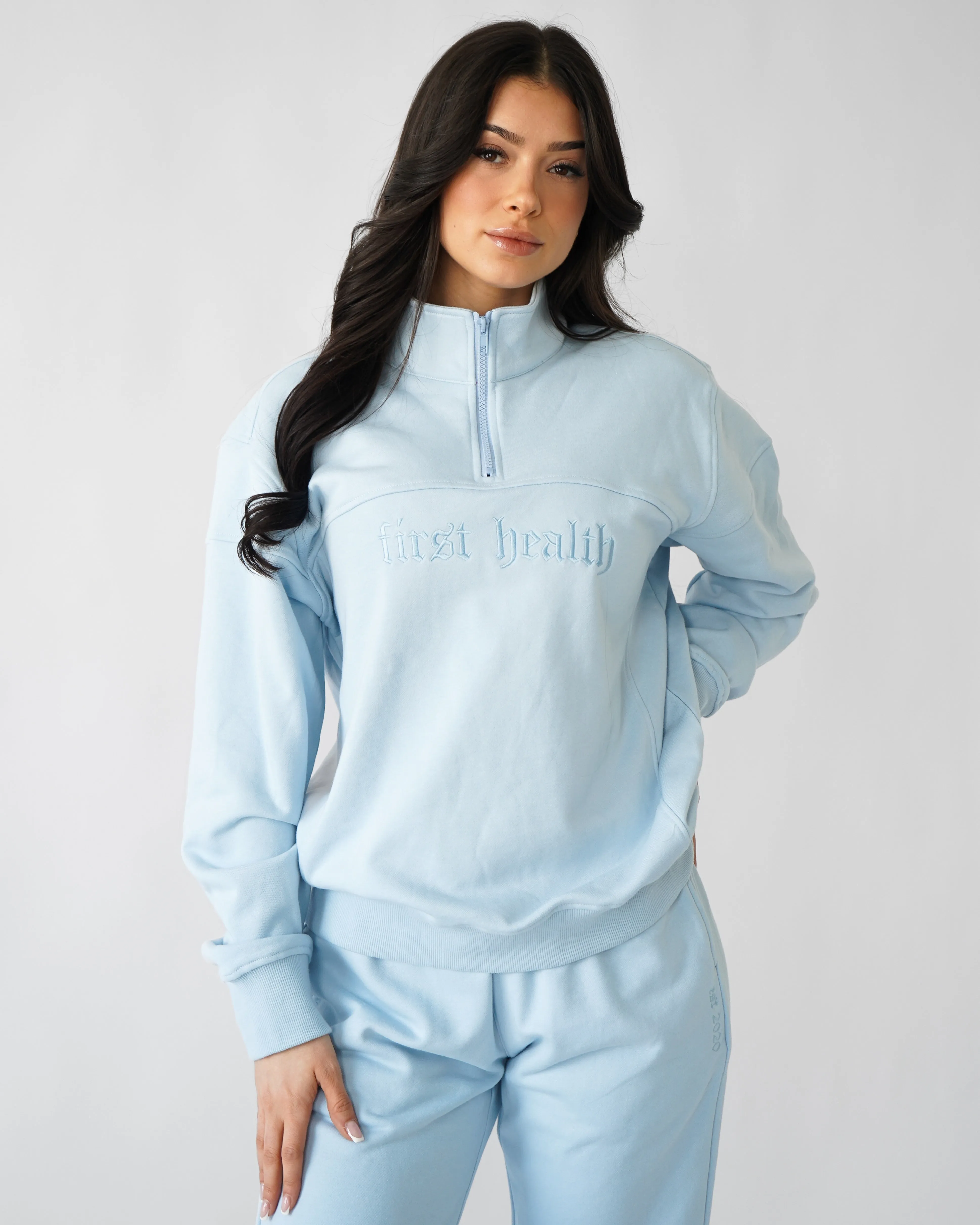 Essential Quarter Zip - Cloud sold by First Health Apparel