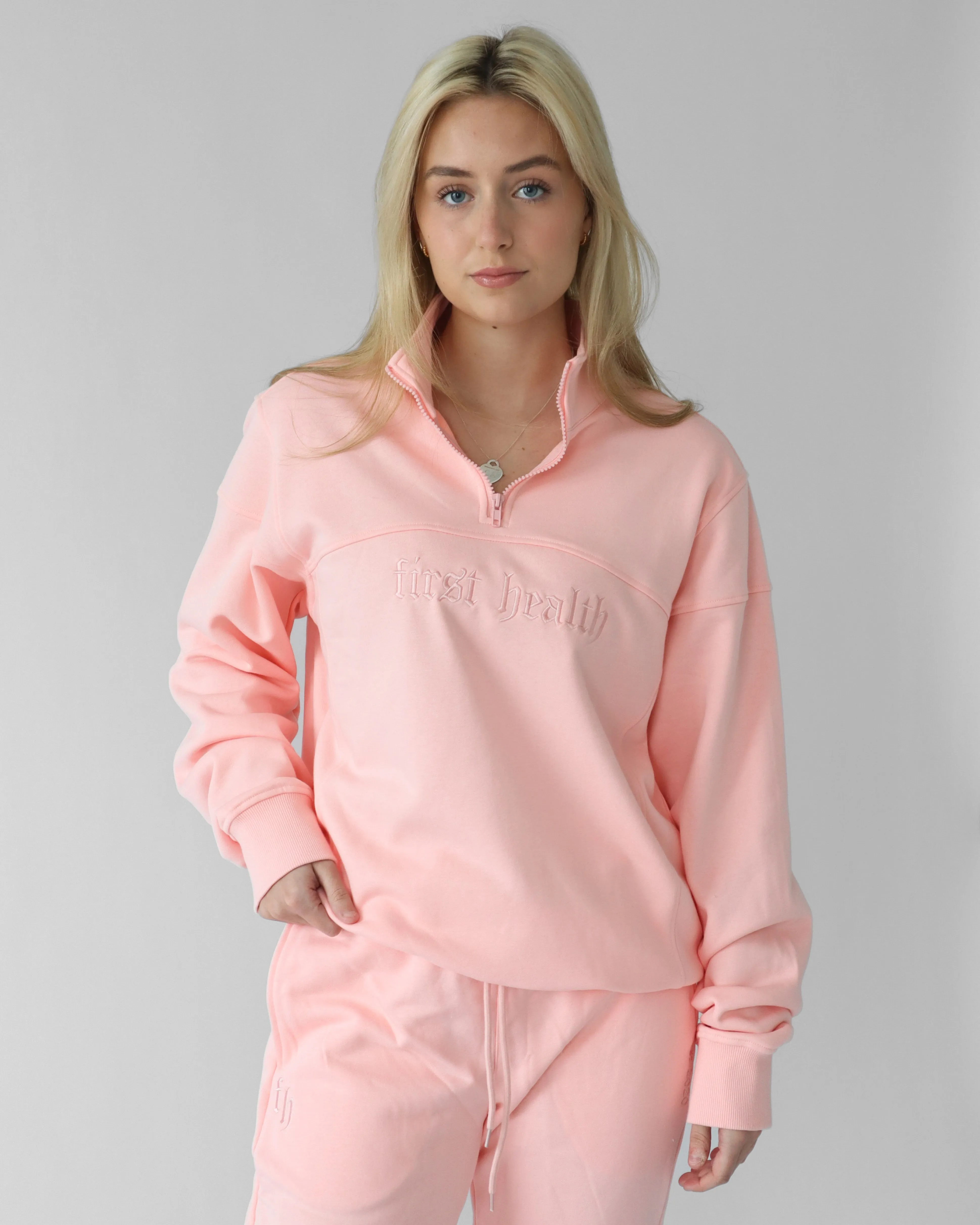 Essential Quarter Zip - Blush sold by First Health Apparel