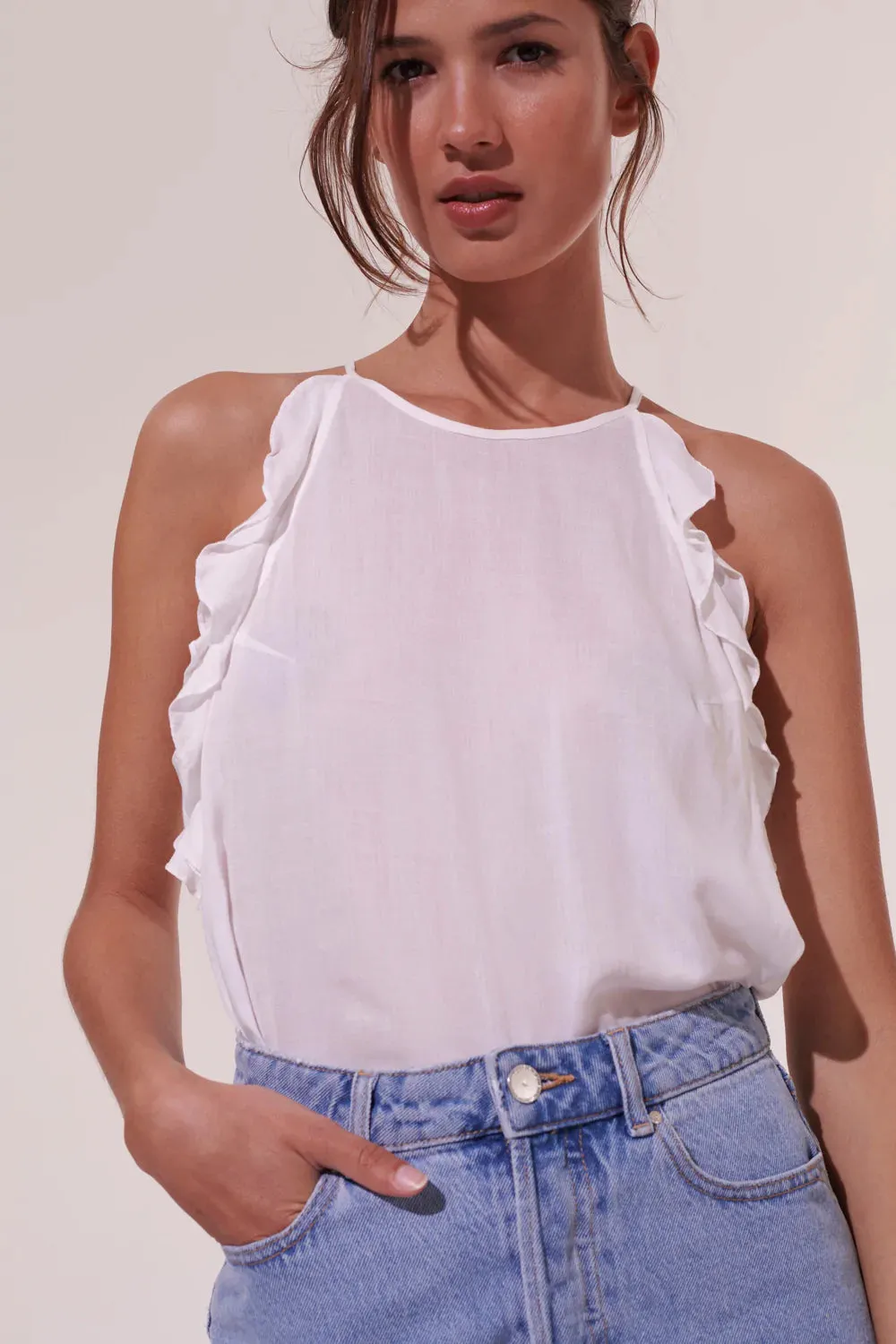 White Sleeveless Top with Ruffled Trim sold by Sand Dollar