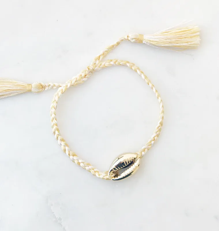 Braided Cowrie Shell Pull Tie Bracelet Cream Gold sold by Sand Dollar