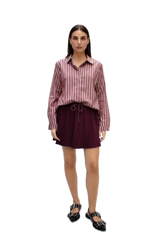 Gonna a pieghe con fiocco sold by Apartamento