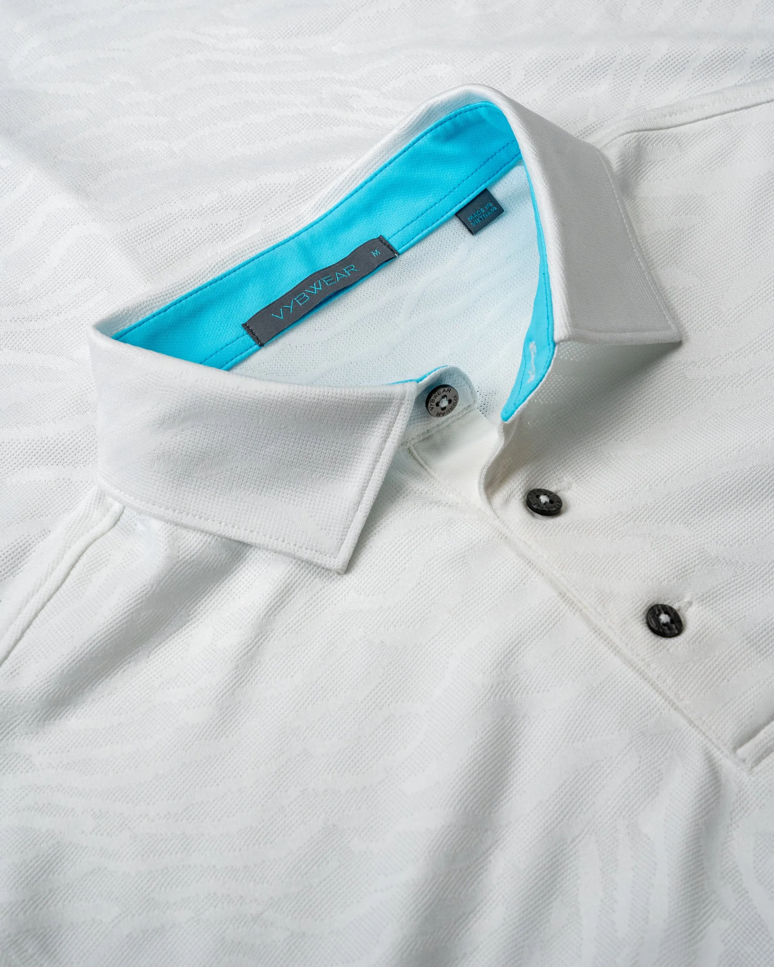 Wave Jacquard Polo sold by Vybwear