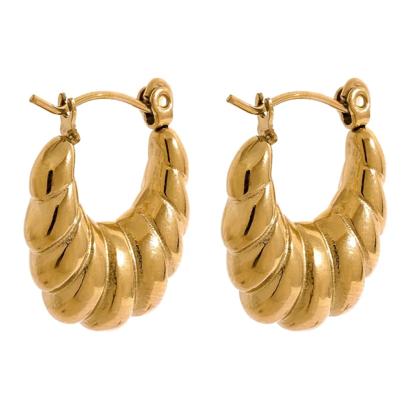 Croissant Earrings sold by Pusca