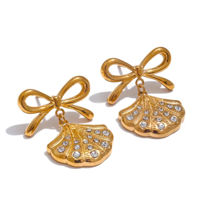 Shell Bow Earrings sold by Pusca