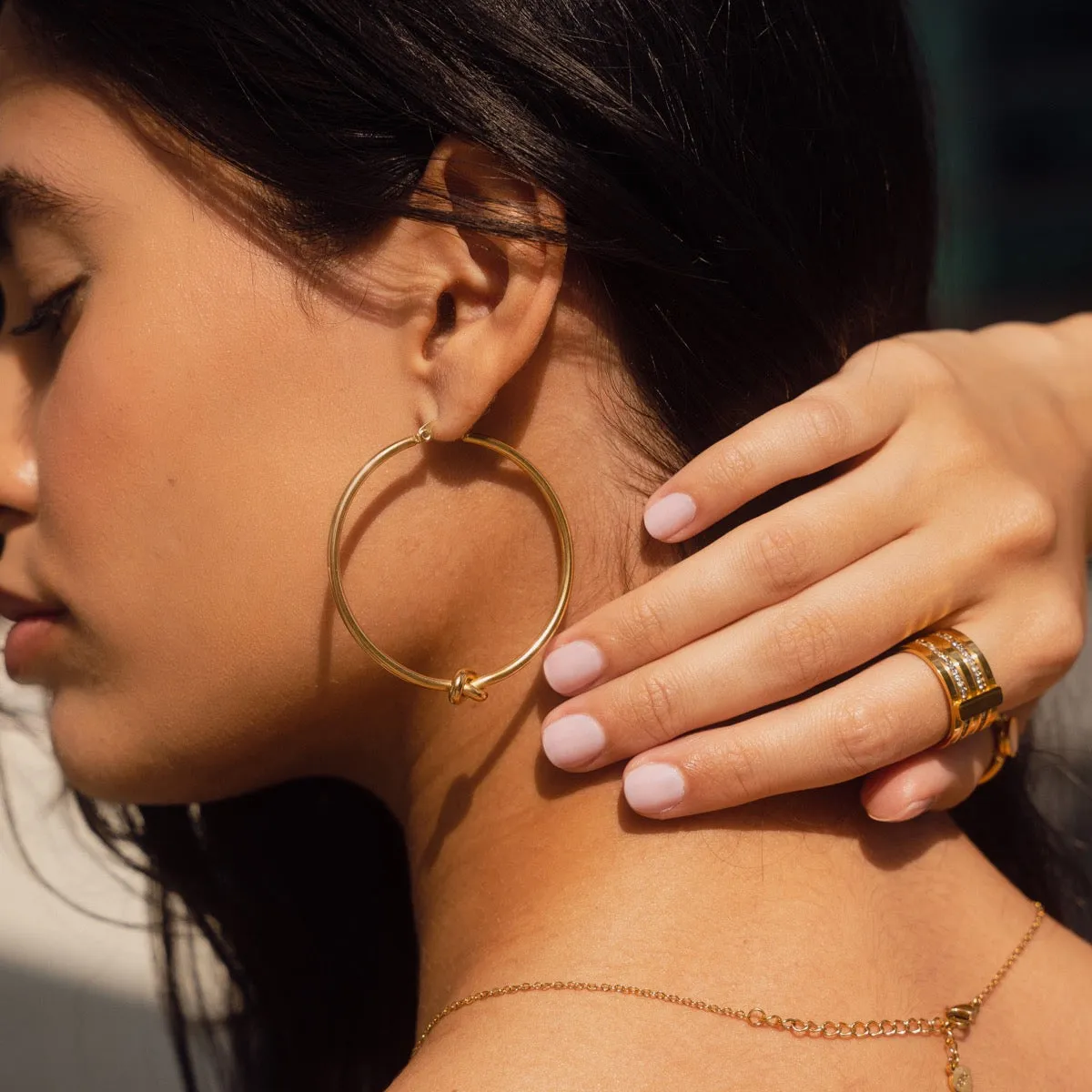 Knotted Hoop Earrings - Gold sold by Pusca product image thumbnail 2