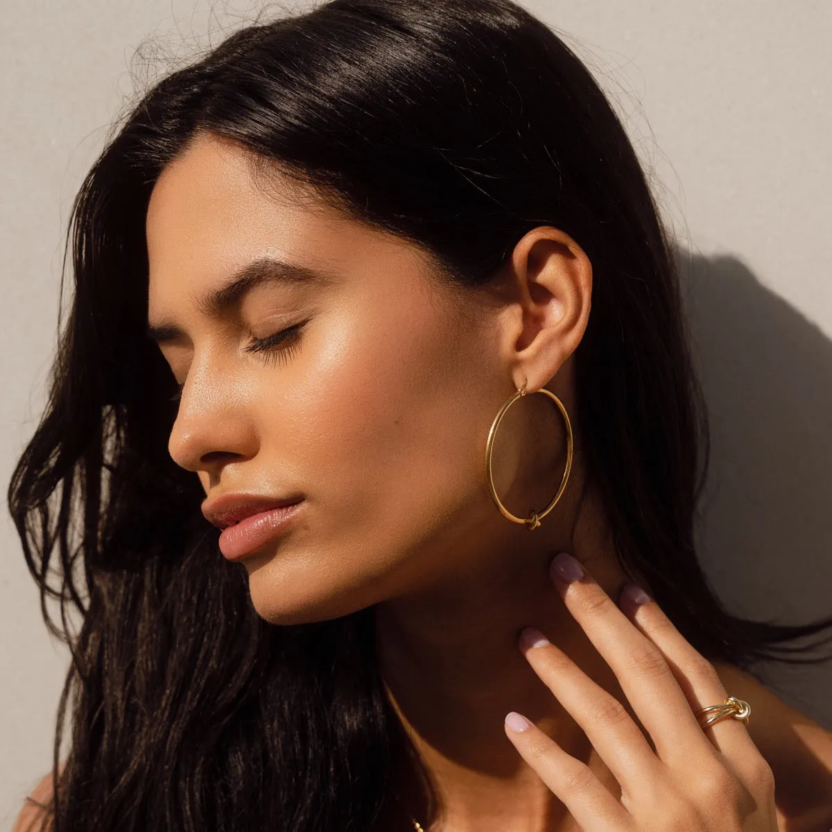 Knotted Hoop Earrings - Gold sold by Pusca product image thumbnail 3