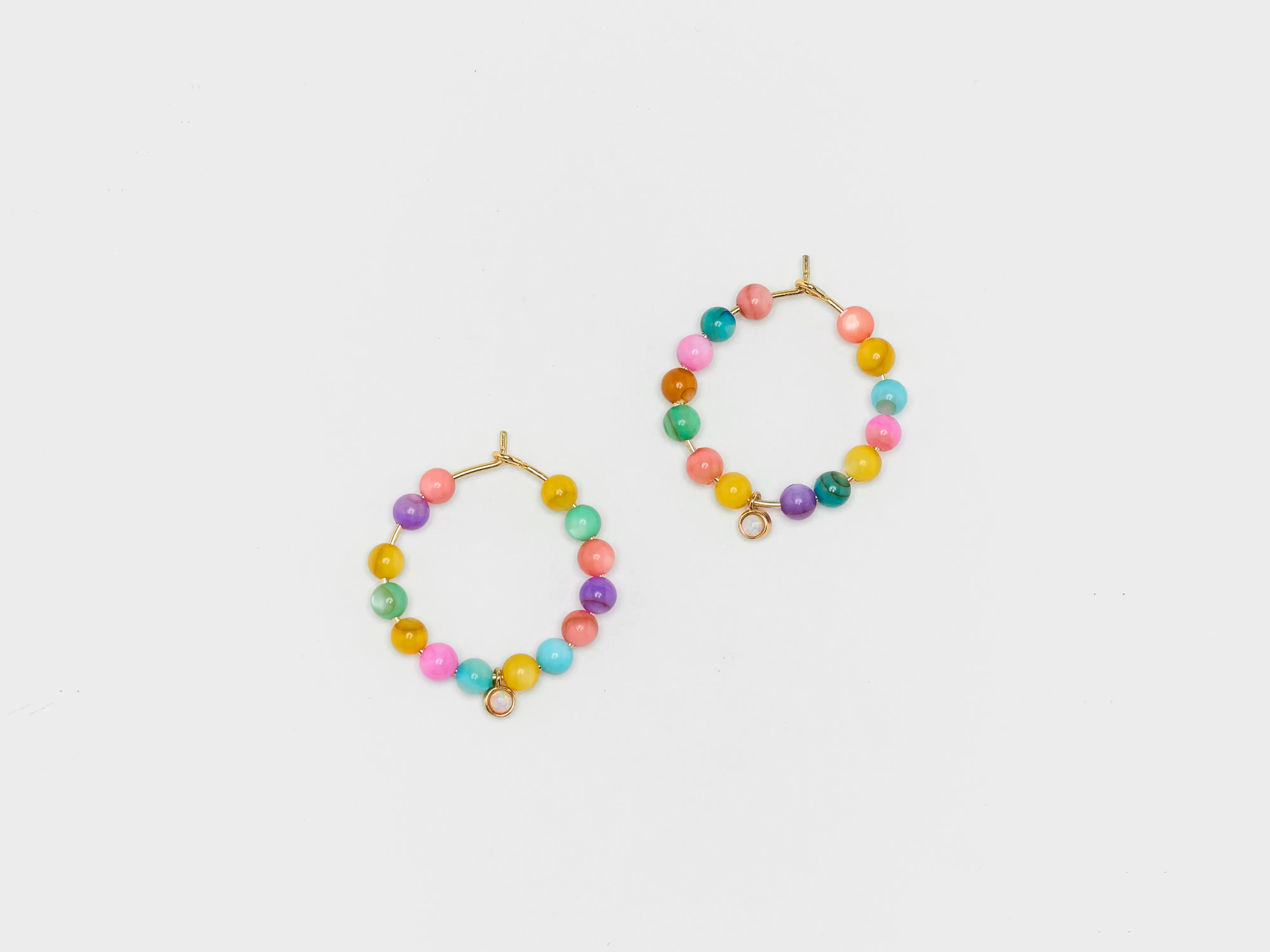 Carnival Hoop Earrings (251 / W / GOLD) sold by Bellrose