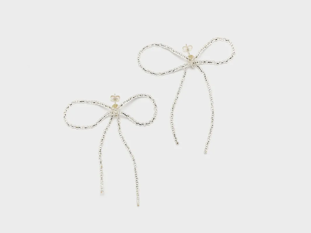 Sad Bow Ear Stick Earrings  (252 / W / SILVER) sold by Bellrose