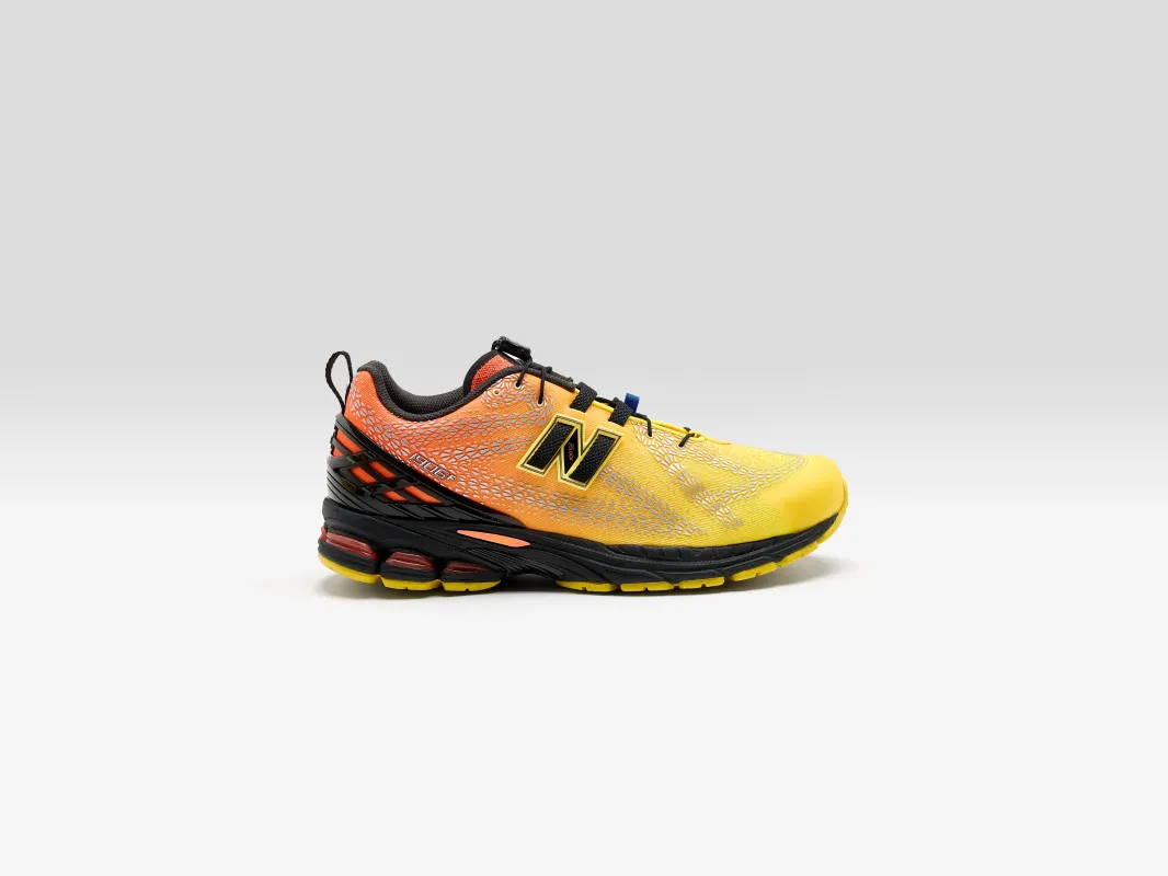 1906F for Men  (261 / M / ORANGE FLUO) made by New Balance