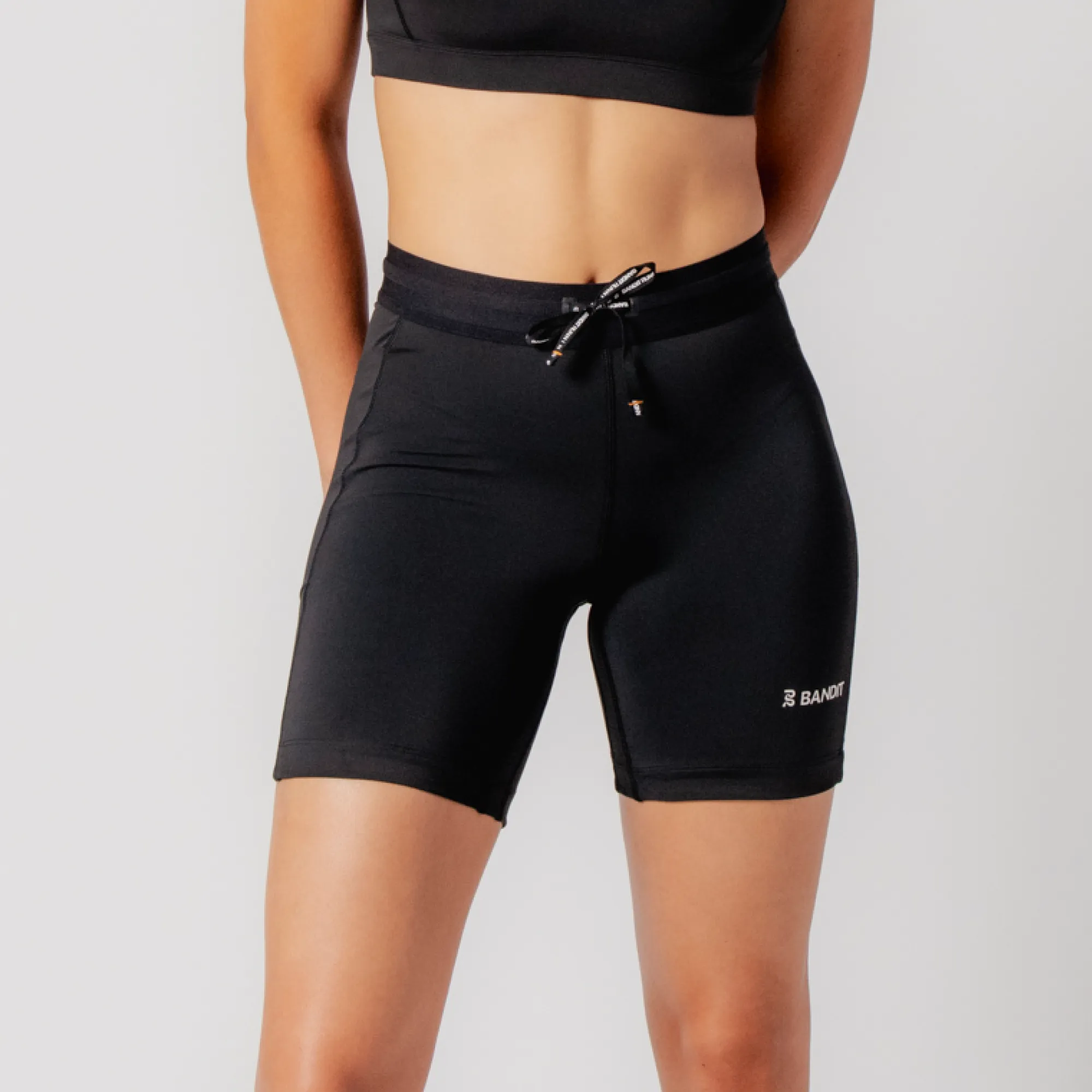 Stamina™ 7" Compression Short, Women's - Black sold by Bandit Running