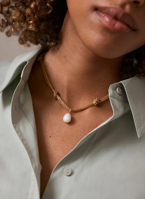 Gold Tone Pearl Knot Necklace sold by Mint Velvet