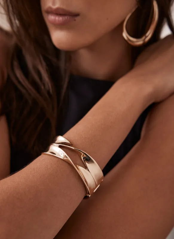 Gold Tone Twisted Bangle sold by Mint Velvet