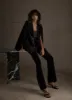 Black Velvet Flared Trousers sold by Mint Velvet