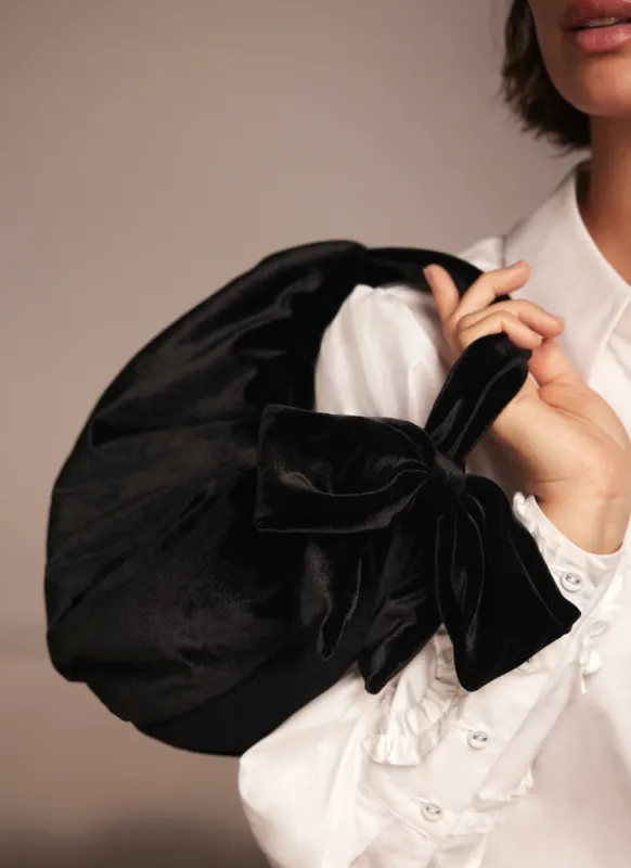 Black Velvet Bow Grab Bag sold by Mint Velvet