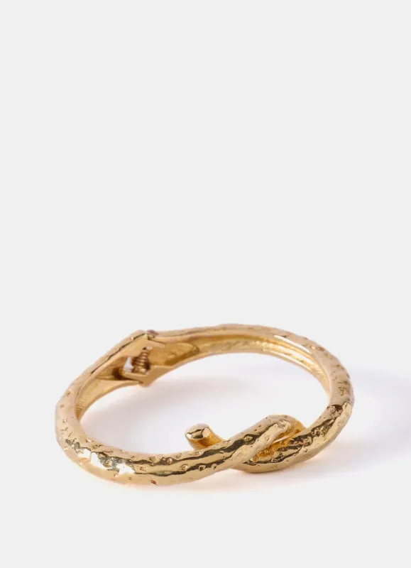 Gold Tone Twisted Bangle sold by Mint Velvet