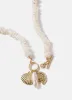 Gold Tone Shell Charm Necklace sold by Mint Velvet