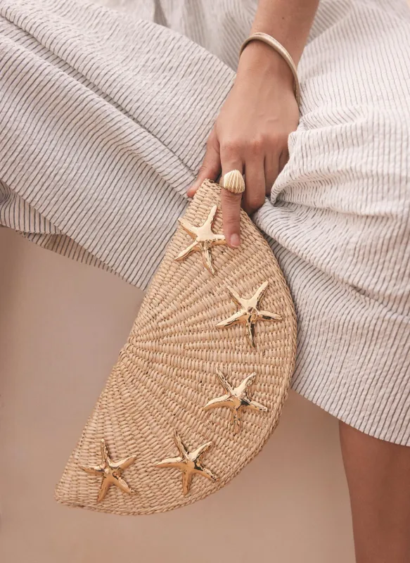 Neutral Straw Starfish Clutch Bag sold by Mint Velvet