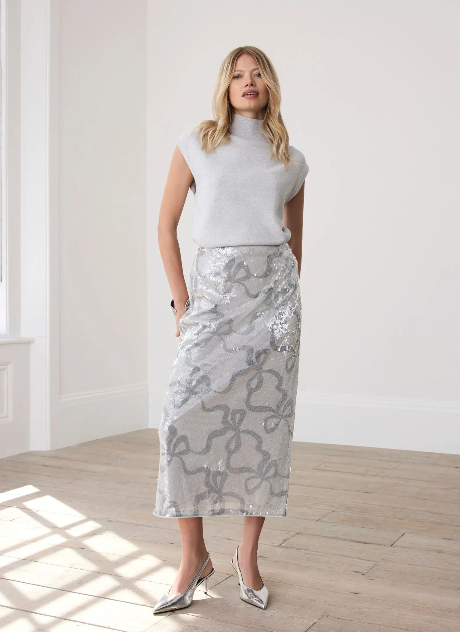 Silver Sequin Bow Print Pencil Skirt sold by Mint Velvet
