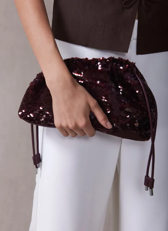 Raya Burgundy Sequin Drawstring Bag sold by Mint Velvet