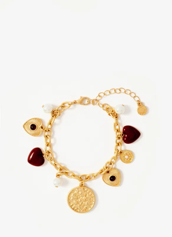 Gold Tone Multi Charm Bracelet sold by Mint Velvet