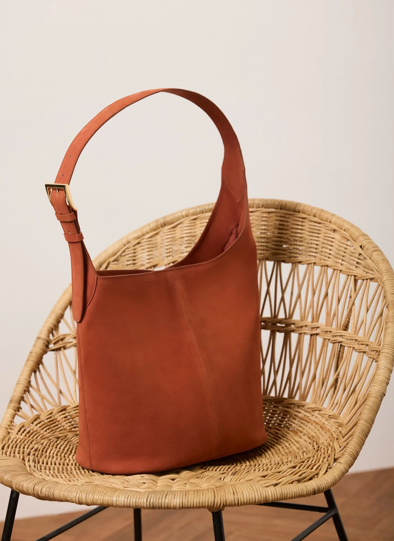 Alexa Orange Suede Bucket Bag sold by Mint Velvet